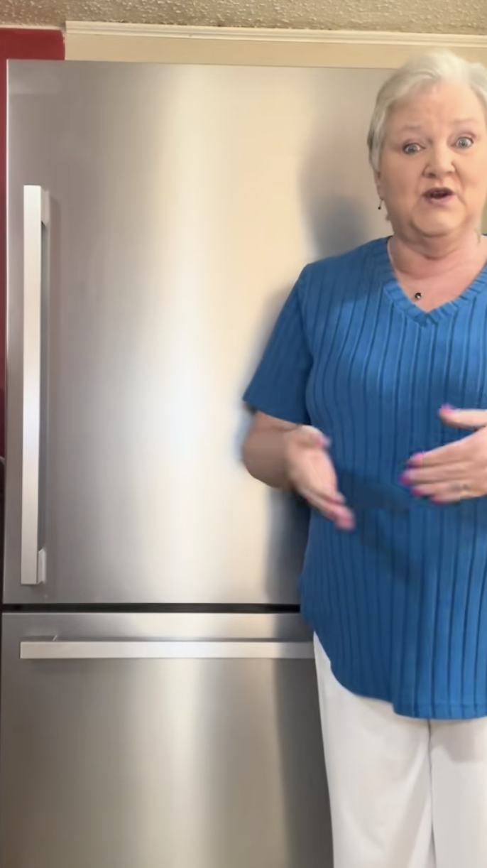 woman talking about her refrigerator